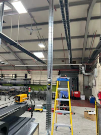 a large warehouse with a lot of equipment in it